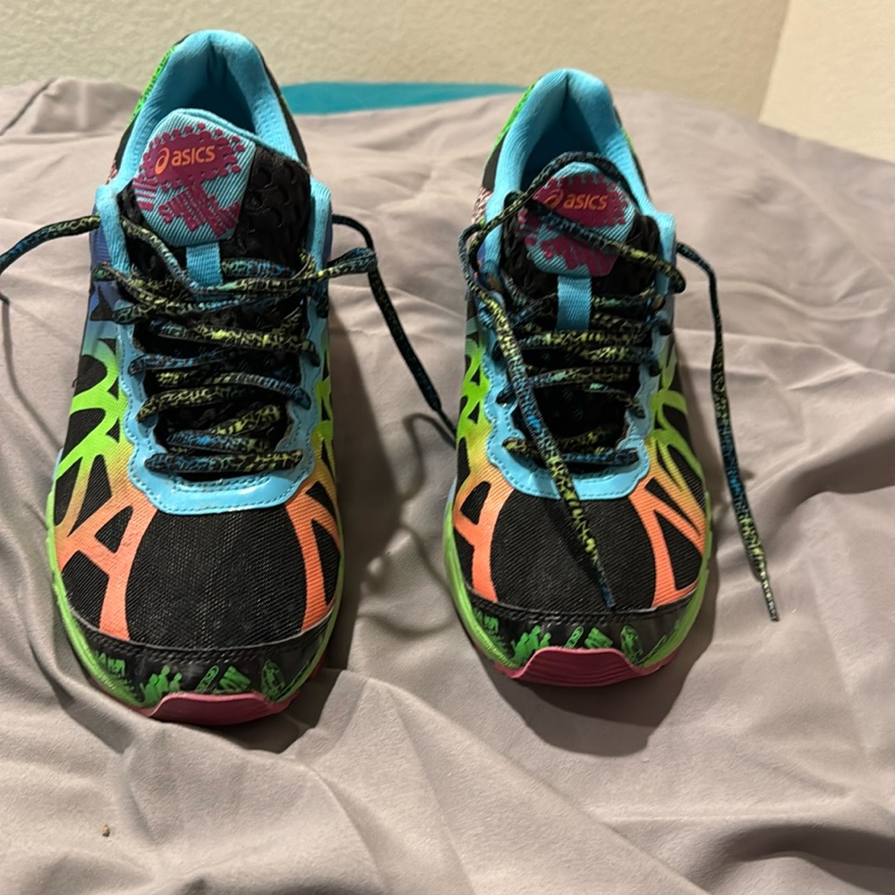 Women’s worn ASICS.